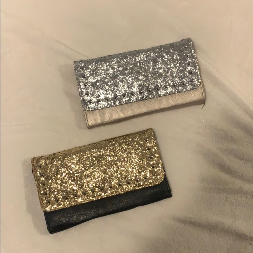 Two, sequin clutches.